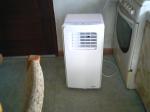 Un climatiseur  mobile  en  bon  état - Miniature