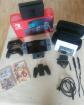 Nintendo switch + zelda breath of the wild (+2 dlc) +... - Miniature